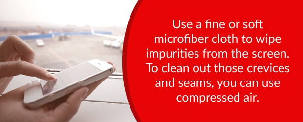 Use a microfiber cloth or compressed air to clean phone impurities